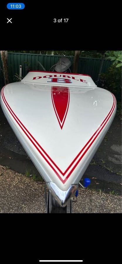 A rare 21-foot Bullet 1750 performance boat for sale, featuring a sleek and aerodynamic design. This Australian-made boat is celebrated for its exceptional handling and immaculate condition. It has had only one owner since new and has been stored in a shed for the past decade, making it a unique 'barn find.' The hull is in pristine condition, offering a rare opportunity for discerning buyers looking for a well-maintained, high-performance vessel